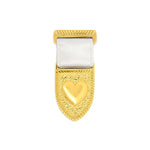 Gold Courageous Love Medal award featuring textured shield, heart emblem, and white ceremonial ribbon