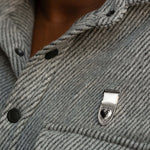 Courageous Love Medal silver shield and heart design worn on jacket as symbolic recognition jewelry